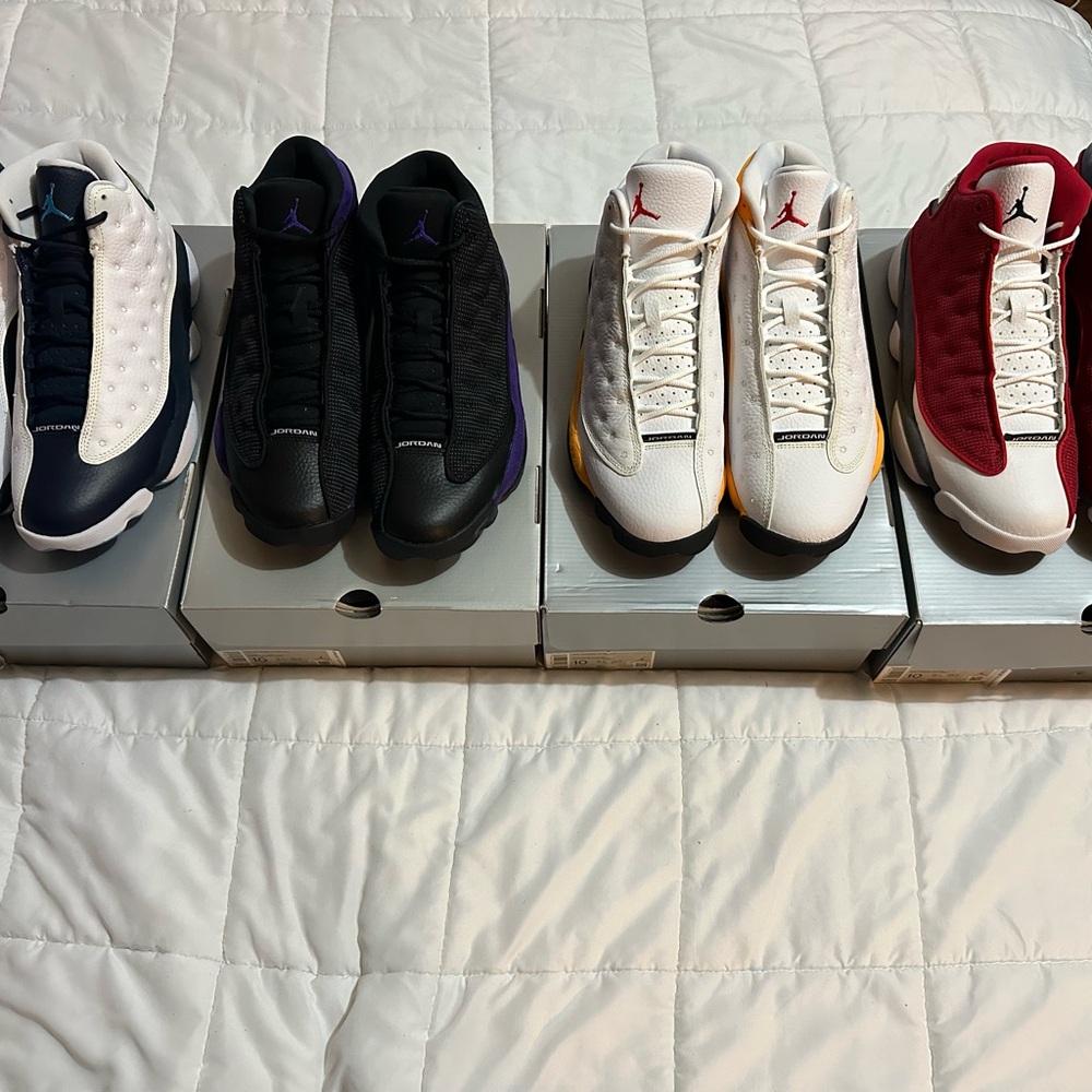 Lots of 4 Air Jordan 13. Blue, Purple, Yellow and Maroon. $820.
